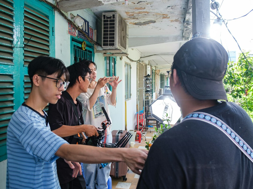 photographer talking to locals