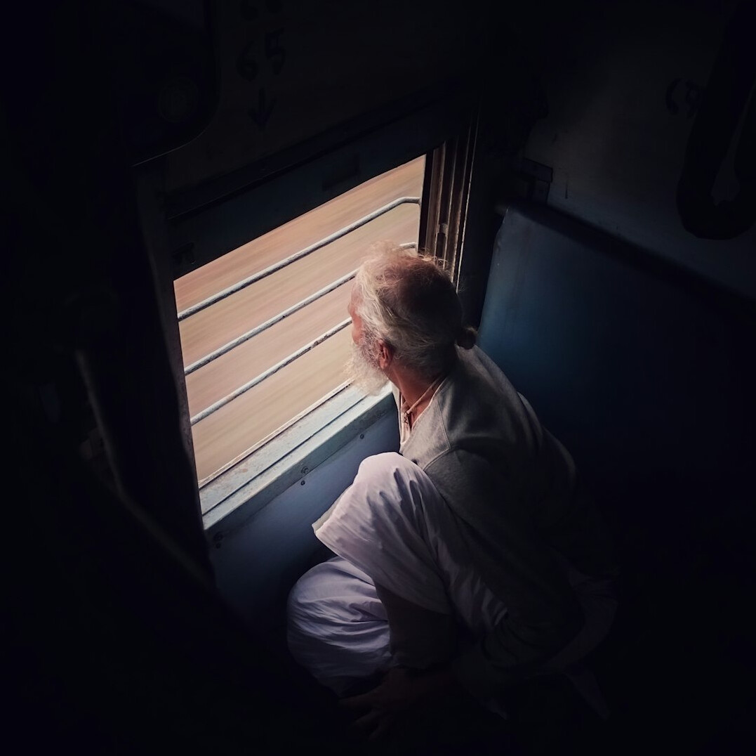 elderly woman at window