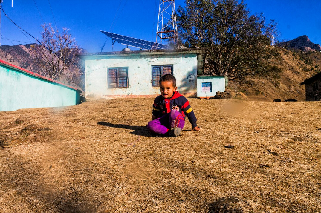 man in village setting