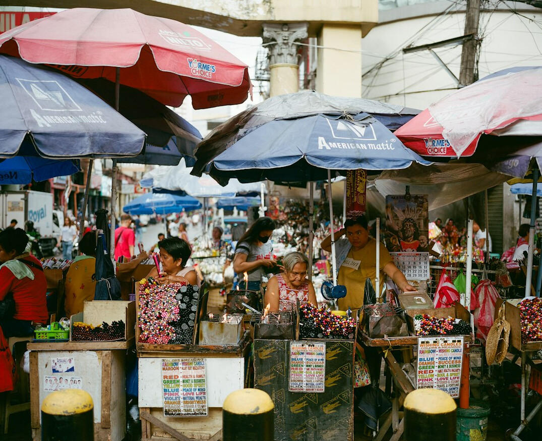 Outdoor market stalls with local vendors