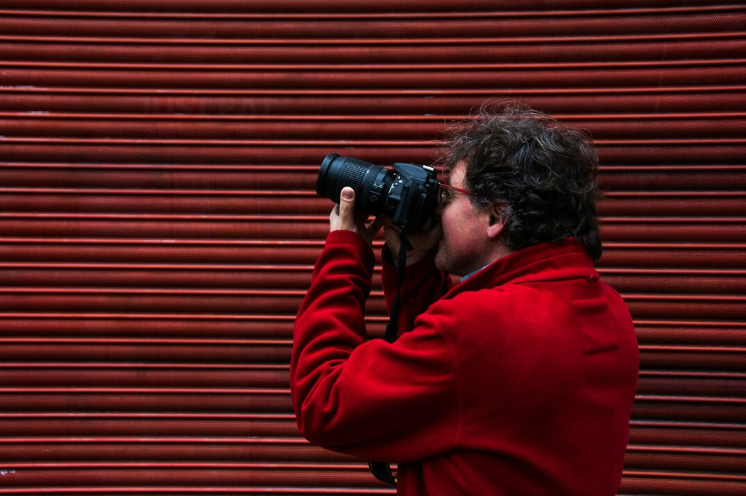 photographer listening to storyteller