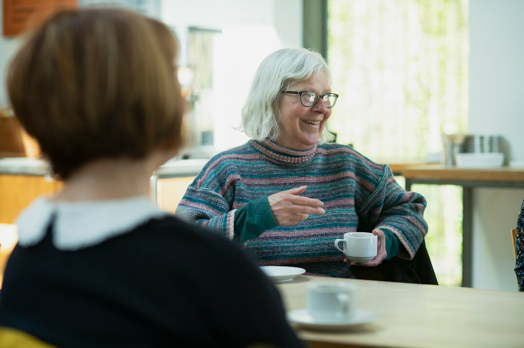 elderly woman telling story